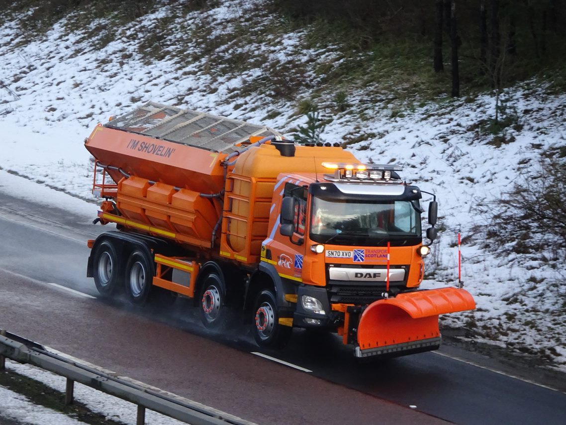 orage gritter on snowy road