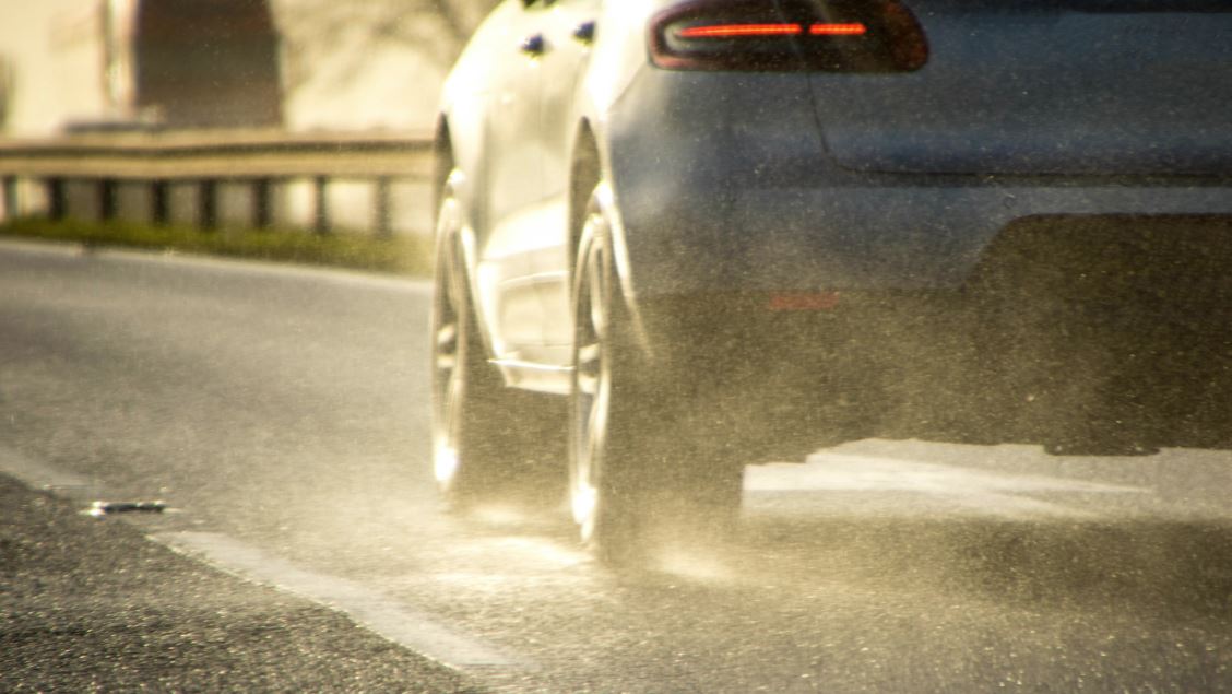 Car in rain in Scotland