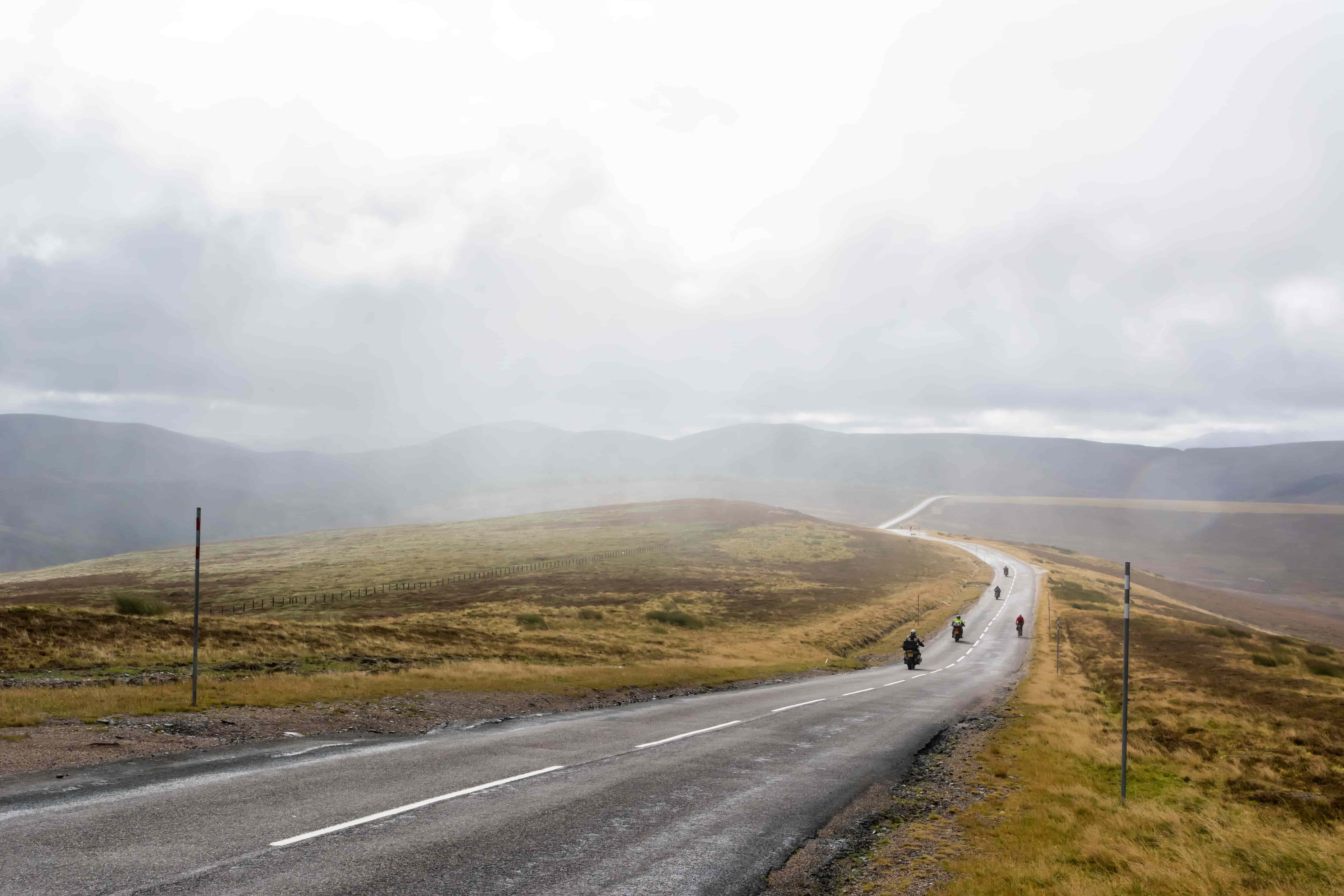 motorbikes riding a country road in the winter